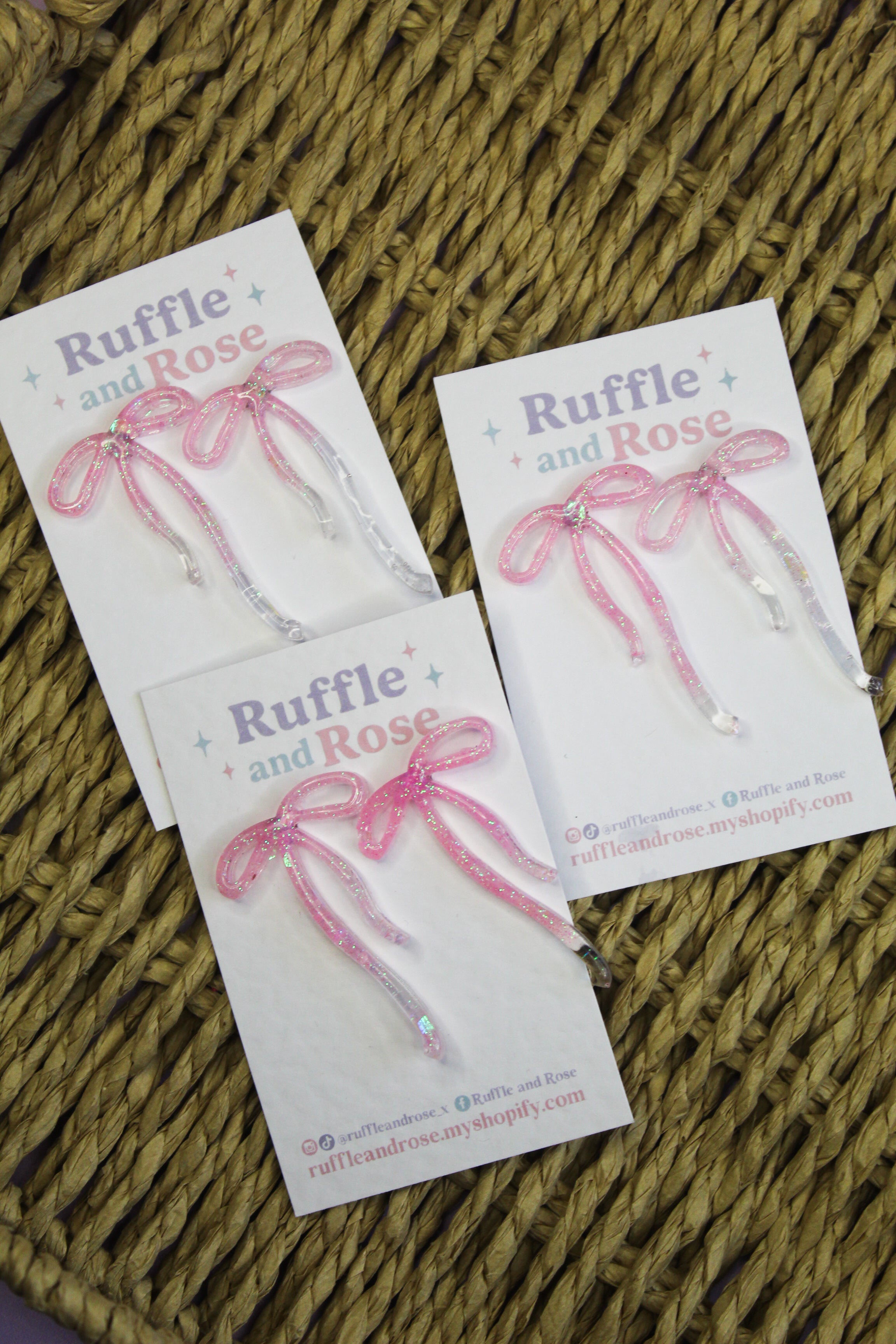 Light Pink Glittered Long Bow Studs